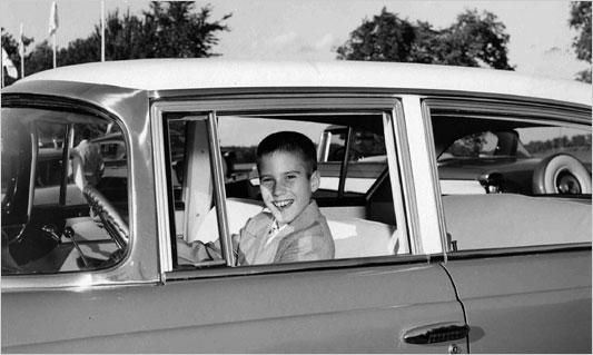 Mitt Romney behind the wheel of a Nash in 1957